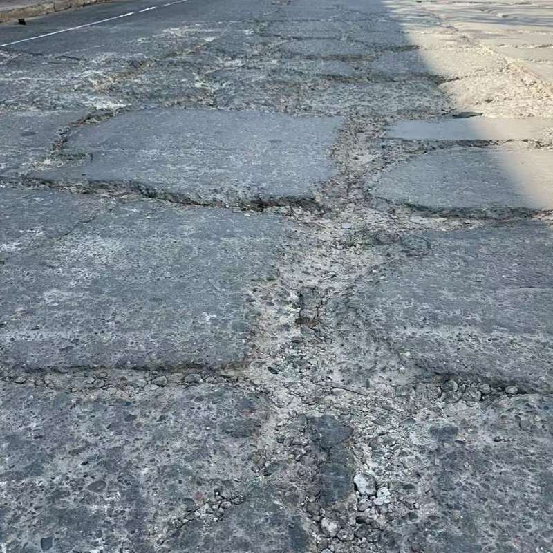贵南路面起砂露石子修补料